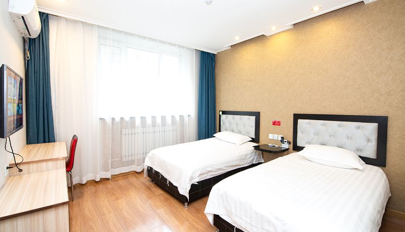 Zimmer - Yilai Mudanjiang Railway Station Hotel