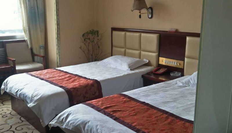 Chambre - Huachen Hotel (Nianqin Street Branch)
