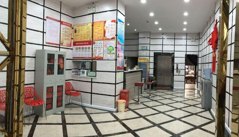 Hotel outdoor area - Jianxin Hotel (Caidian Zhongbai Warehouse Store)