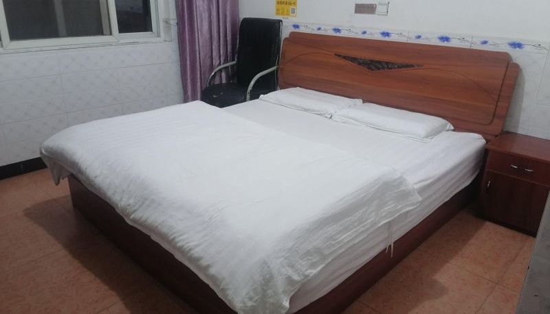 Zimmer - Huayi Business Hotel