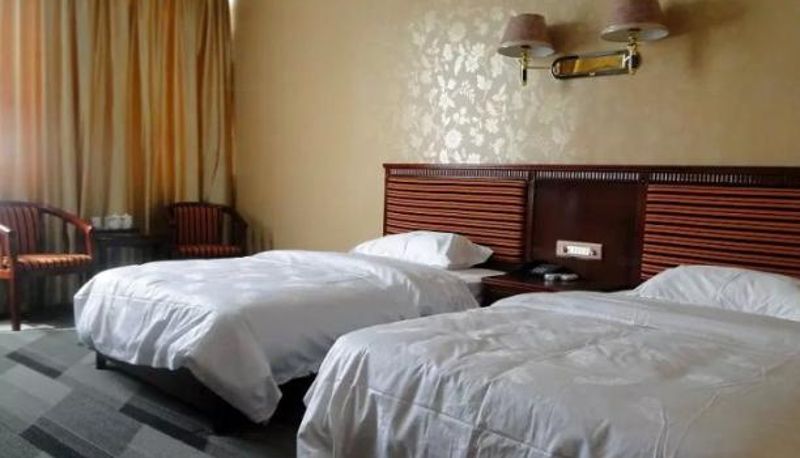 Habitación - Mingwan Business Hotel