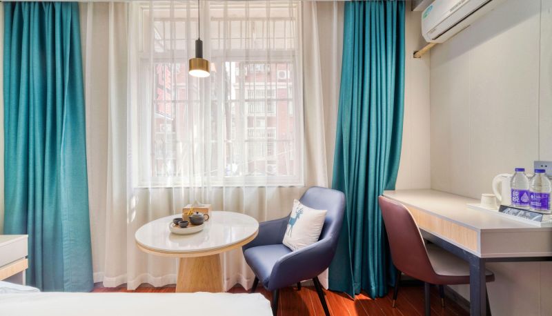 Business-Zimmer - Jingtai Business Travel Hotel (Jiubao Four Seasons Green Clothing Market Store)