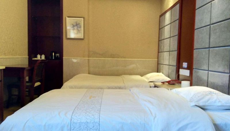 Zimmer - Xinglong Business Hotel