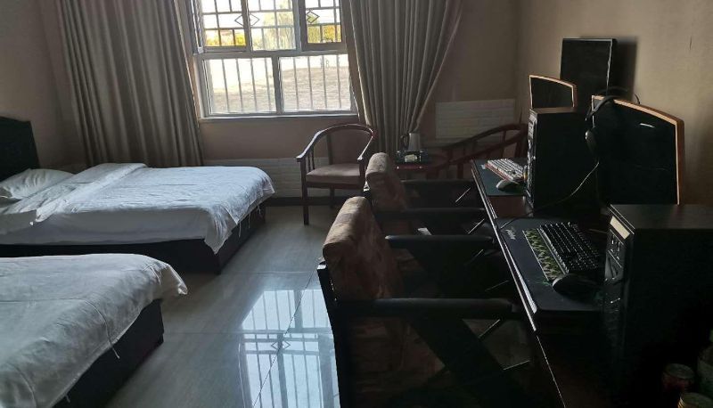 Habitación - Wanshengqing Business Hotel