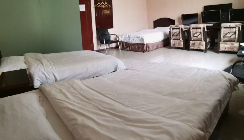Habitación - Wanshengqing Business Hotel