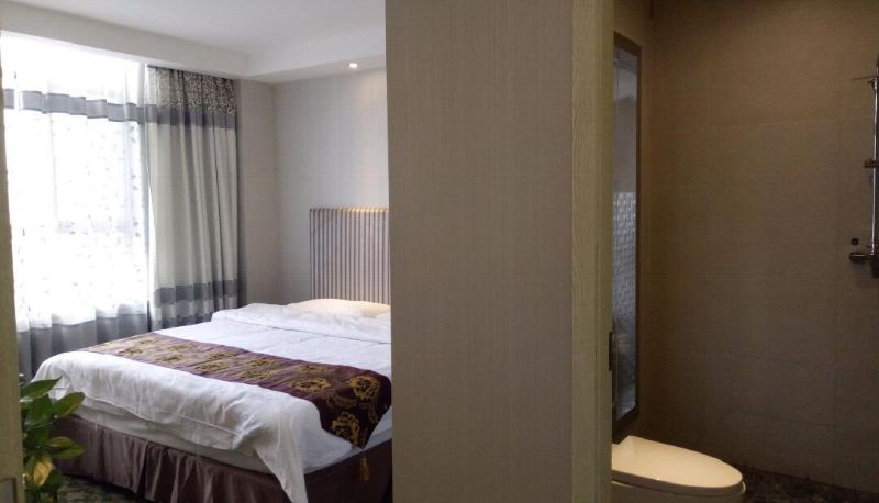 Zimmer - Wanshengqing Business Hotel