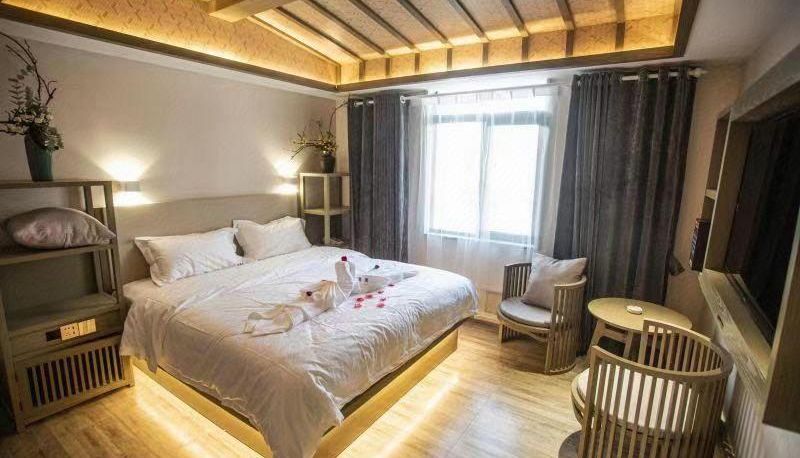 Zimmer - Dayu Bailuli Cultural Hotel