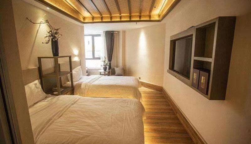 Zimmer - Dayu Bailuli Cultural Hotel