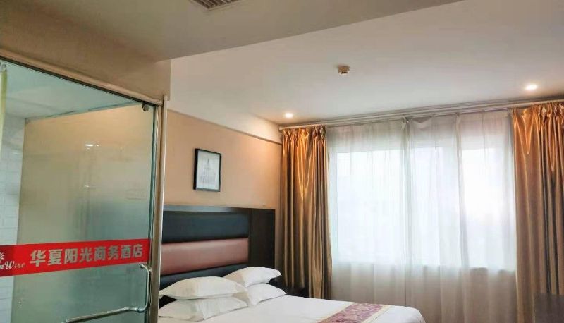Zimmer - Huaxia Sunshine Business Hotel (989 Hospital Branch)