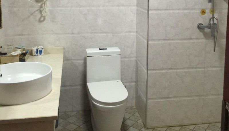 Zimmer - Xinyang Business Hotel (Hekou Port Branch)