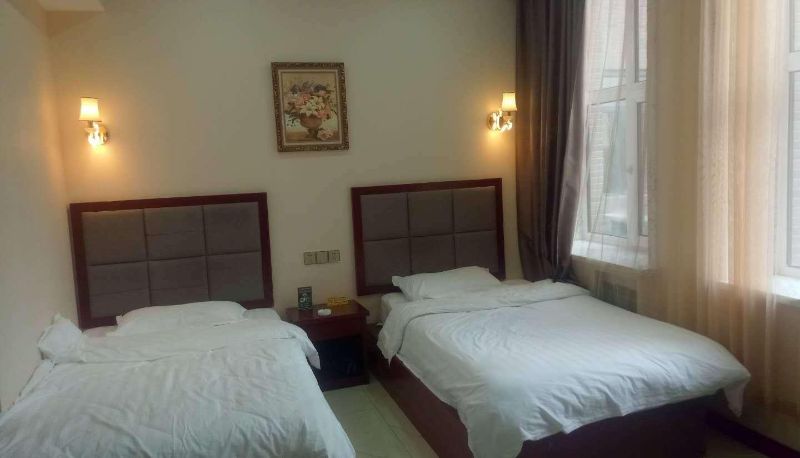 Zimmer - Fuyuan Yuanpeng Holiday Hotel