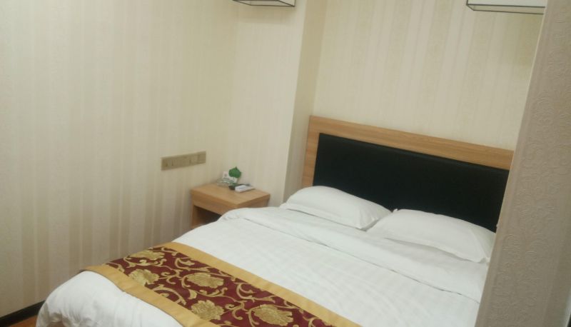 Zimmer - Yimeishi Business Hotel