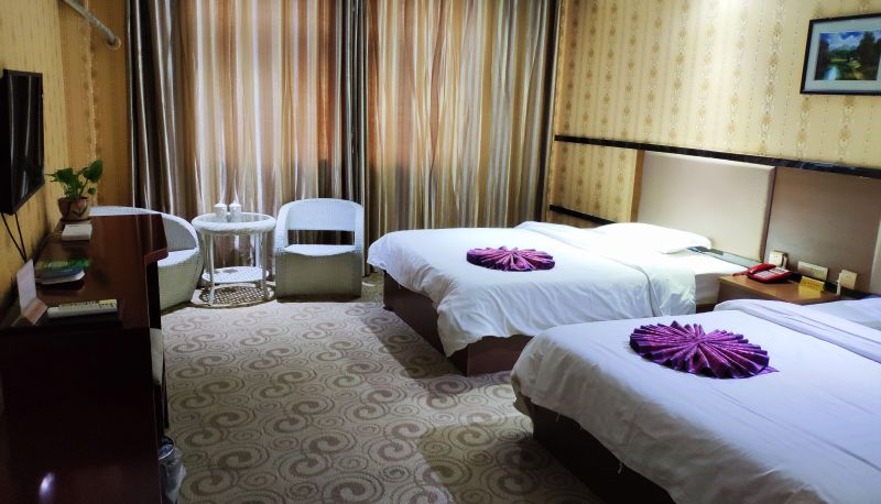 Zimmer - Hua'an Business Hotel (Railway Station Branch)