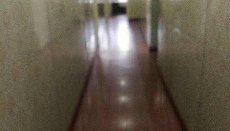 Zewnętrzna część hotelu - OYO Baolong Hotel