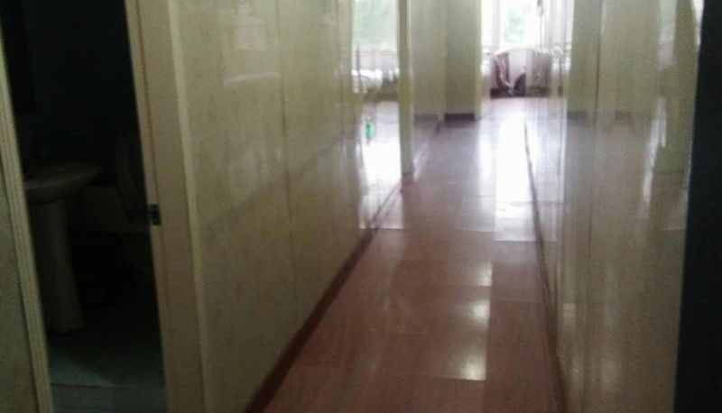Zewnętrzna część hotelu - OYO Baolong Hotel