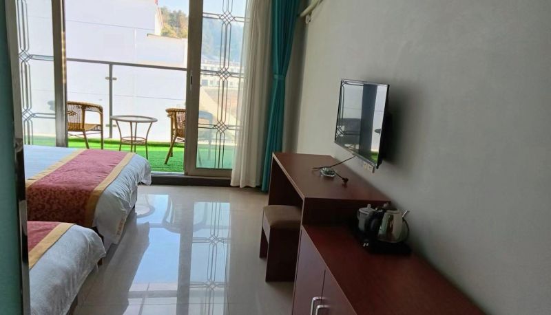 Zimmer mit Balkon - Wanshun Hotel (Tiantangzhai Scenic Area Store)