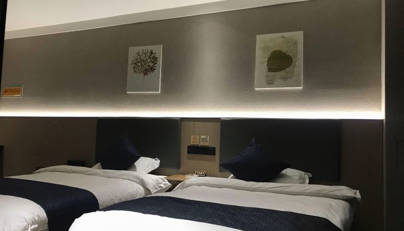 Zimmer - Huayi Hotel (Home Inn's Kuche Tianwu Square Branch)