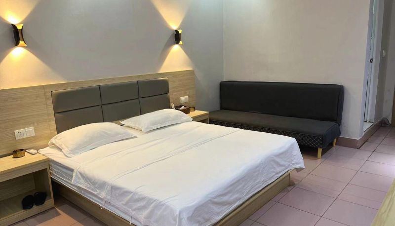 Zimmer - Qimi Hotel (City College Store)