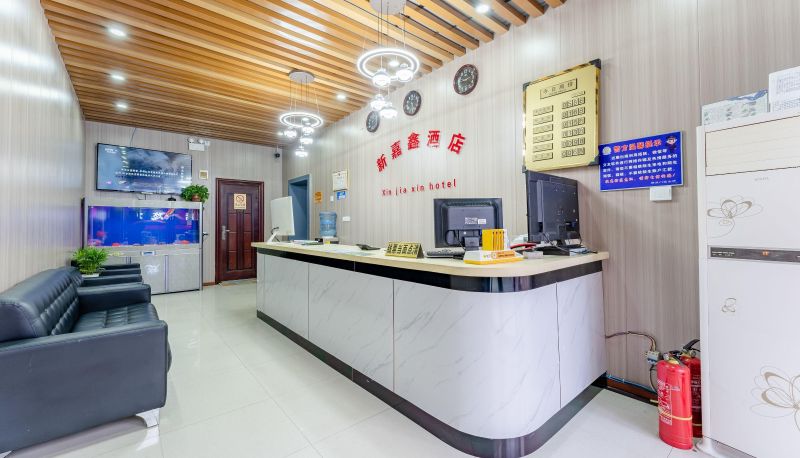 Buitenruimte van het hotel - Xinjiaxin Hotel