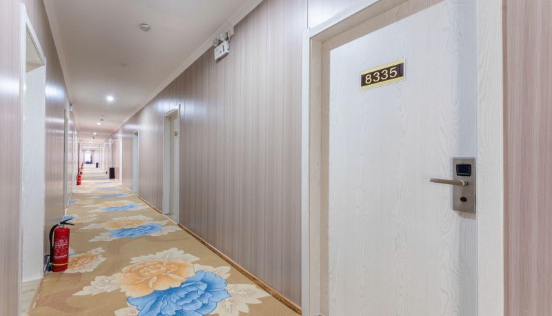 Buitenruimte van het hotel - Xinjiaxin Hotel