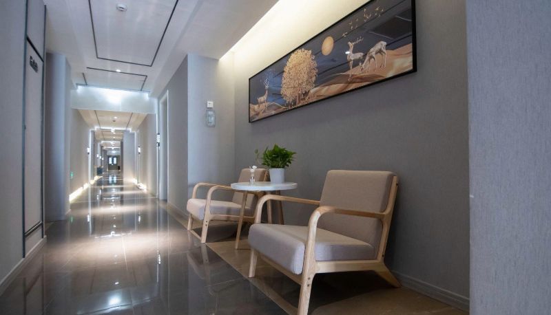 Zona exterior del hotel - Junhao Holiday Inn