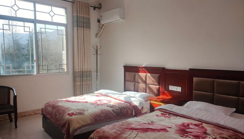 Kamer met uitzicht op de bergen - Yipinyuan Homestay (Wawushan Scenic Area Store)