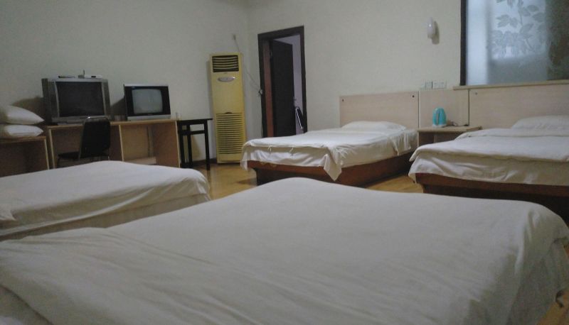 Zimmer - Fushun Business Hotel (Central Bus Station Store)