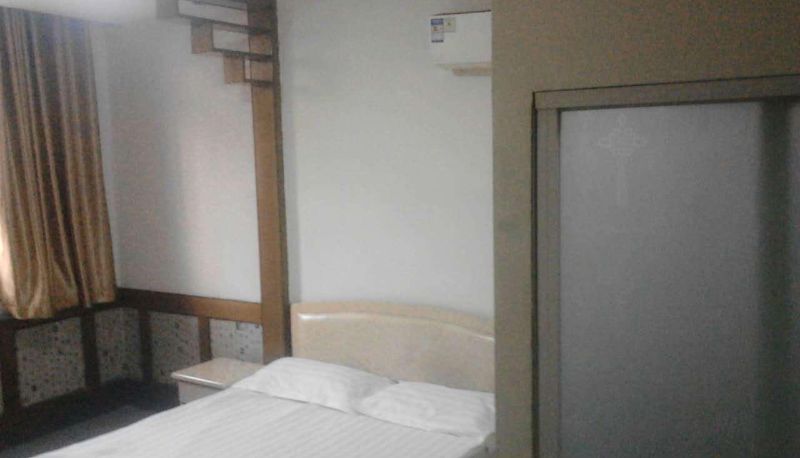 Chambre - Xinhai Business Hotel (Wangshan Street Branch)