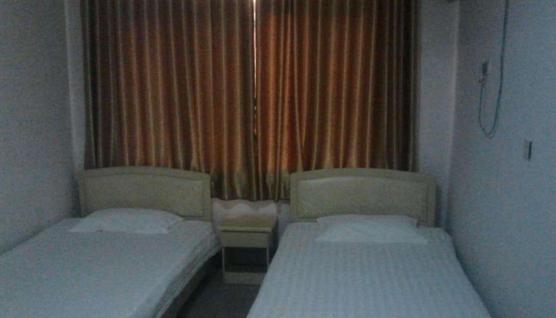 Chambre - Xinhai Business Hotel (Wangshan Street Branch)