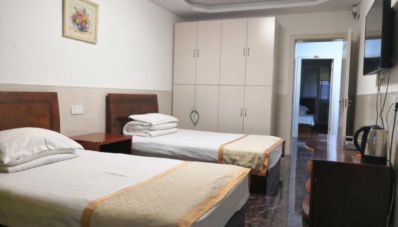 Zimmer - Jinfulai Hotel (Lianyungang Suxin Passenger Station Store)