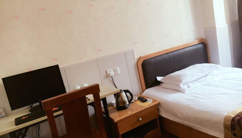 Zimmer - Gangcheng Business Hotel