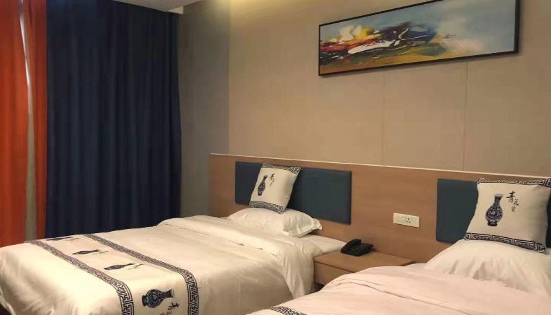Room - Sunshine Holiday Hotel
