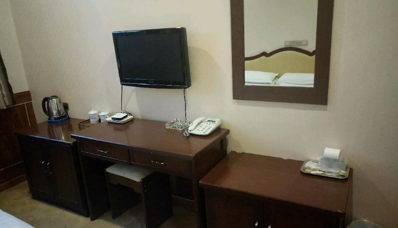 Habitación - Yulong Business Hotel