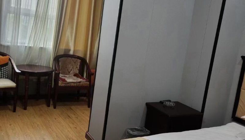 Habitación - Feitian Business Hotel