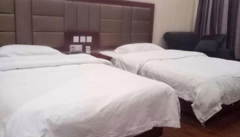 Zimmer - Xinhuiyuan Business Hotel