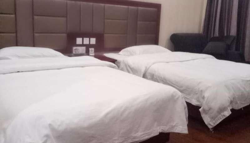 Zimmer - Xinhuiyuan Business Hotel