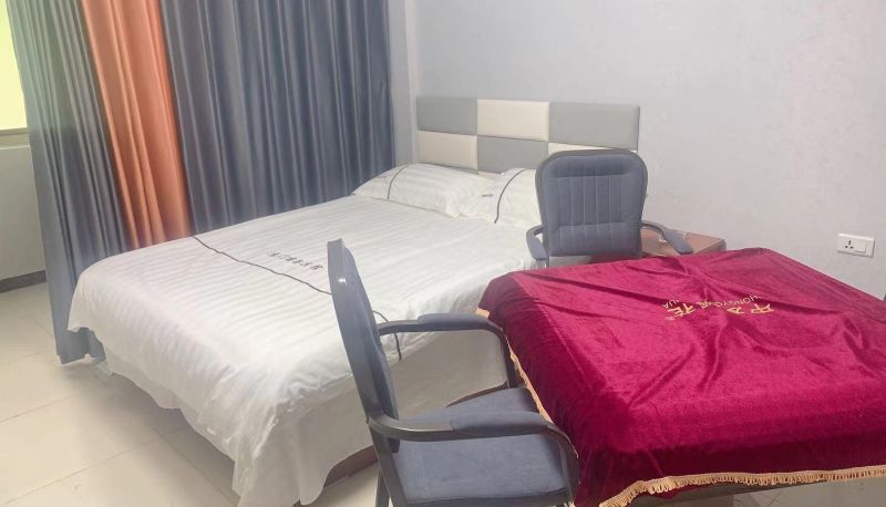Zimmer - Longmen Business Hotel