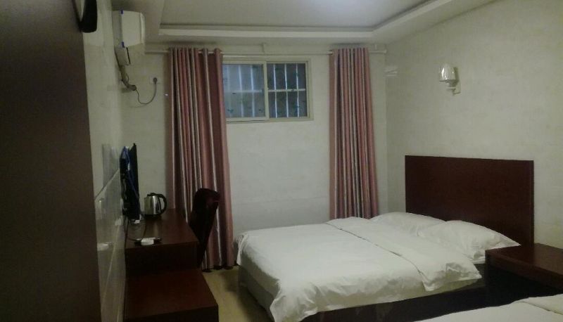 Habitación familiar - Hongchang Hotel (Boai New Century Store)