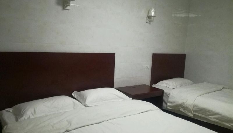Habitación familiar - Hongchang Hotel (Boai New Century Store)