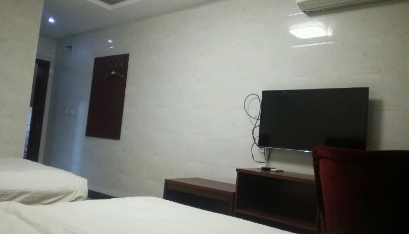 Habitación familiar - Hongchang Hotel (Boai New Century Store)