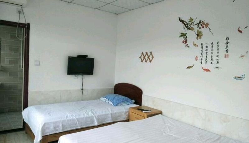 Camera - Qingxin Youshe Family Hotel
