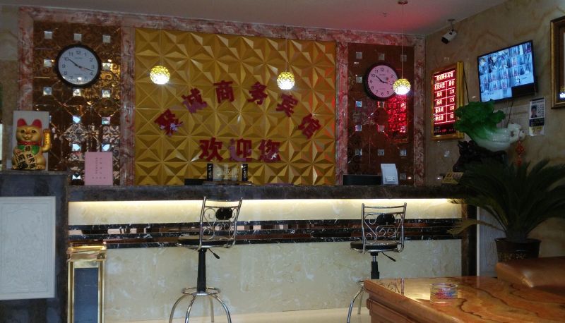 Zona exterior del hotel - Jucheng Business Hotel