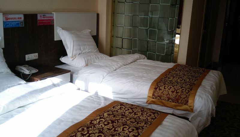 Zimmer - Jucheng Business Hotel