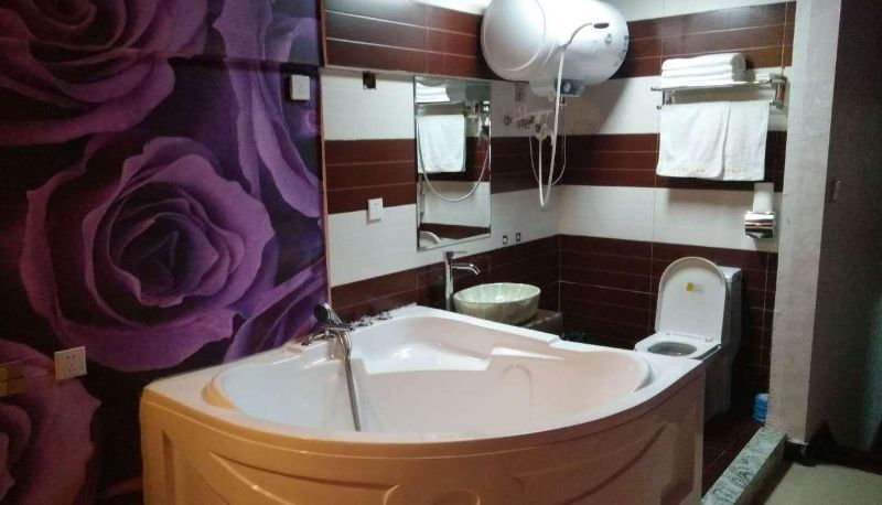 Zewnętrzna część hotelu - Red Apple Hotel