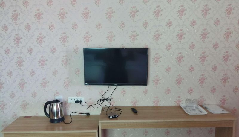 Zewnętrzna część hotelu - Red Apple Hotel