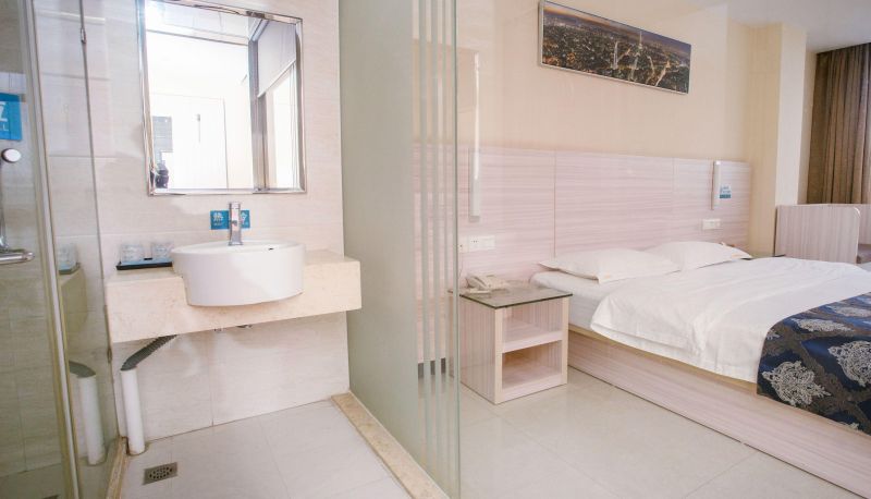 Chambre - Wozhiwo Business Hotel (Hepu Bus Terminal Store)