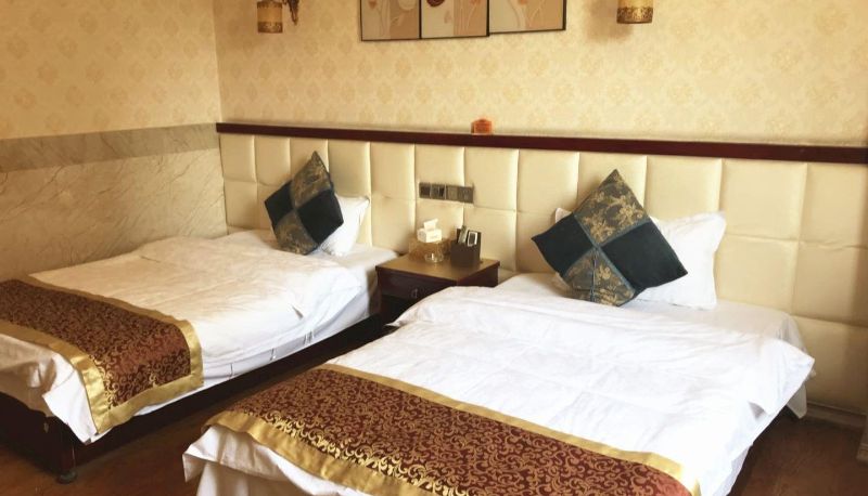 Zimmer - Qinsan Business Hotel