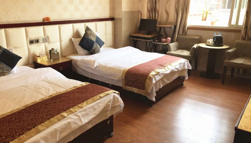 Habitación - Qinsan Business Hotel