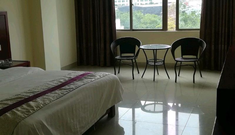 Habitación - Haikou Baolaijing Travel Rental