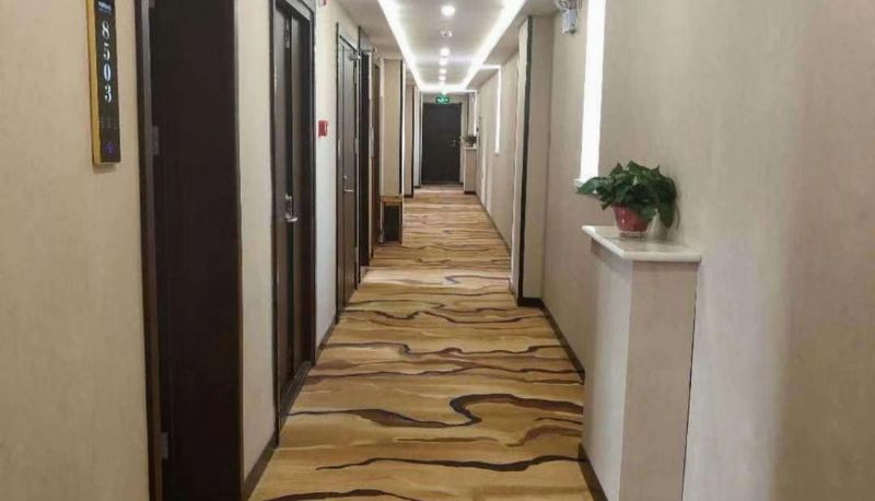 Zona exterior del hotel - Jimandu Business Hotel
